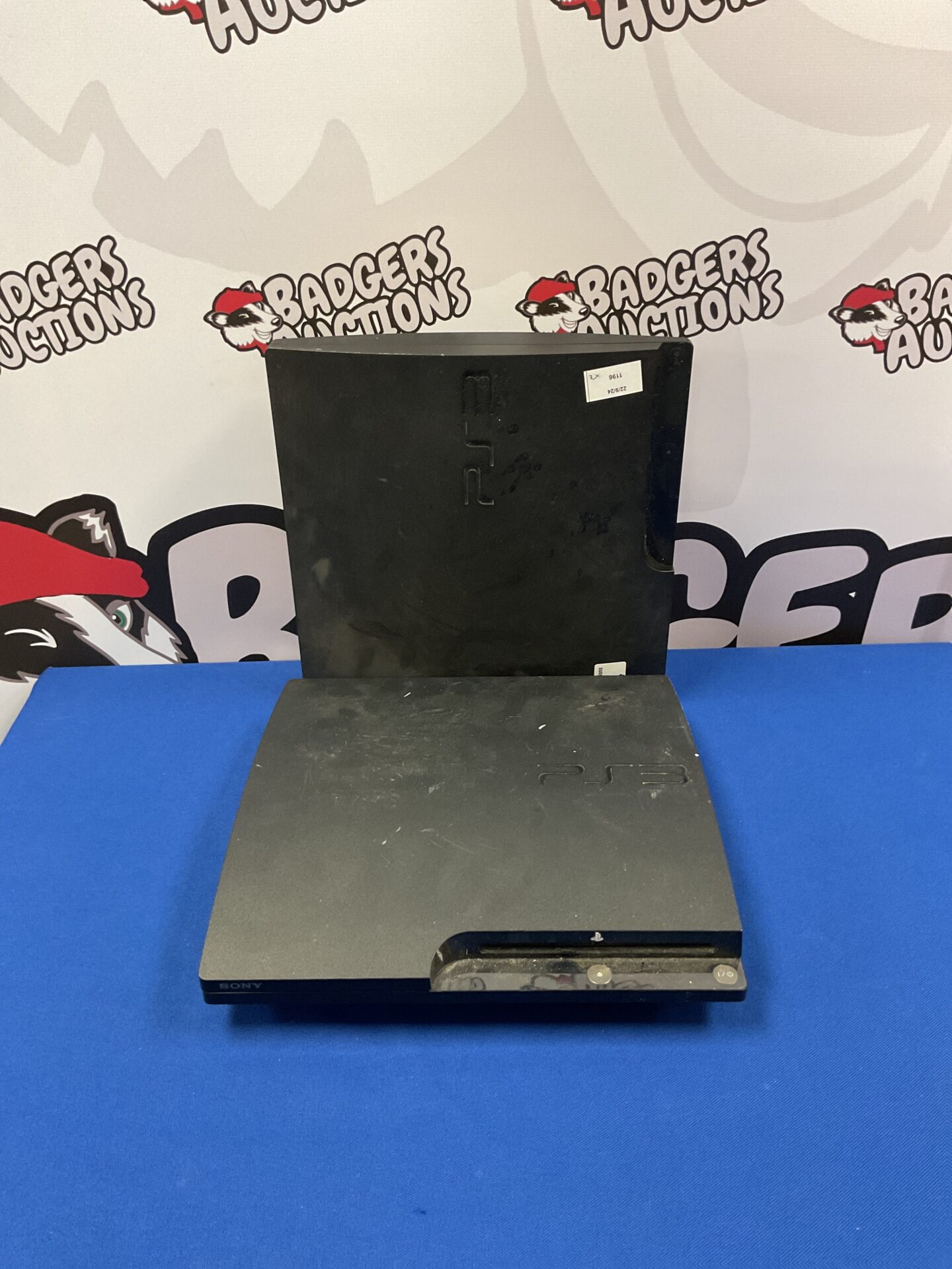 164 Two Sony PlayStation 3 slim consoles