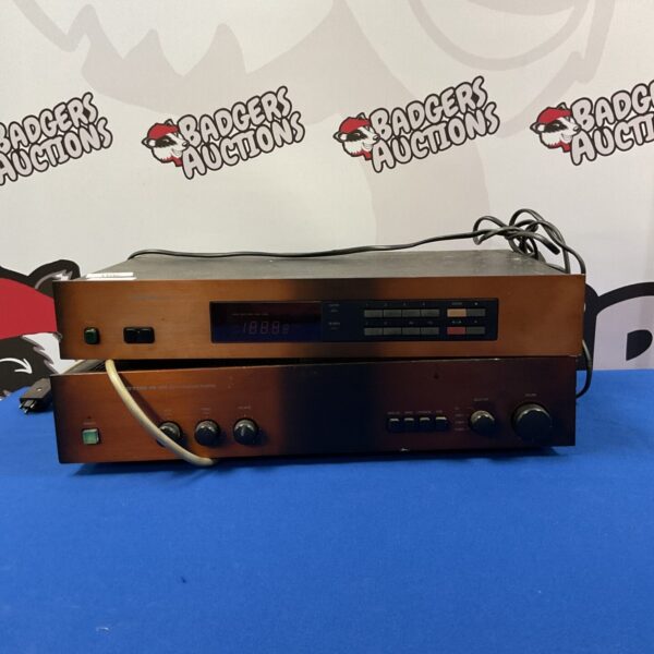 Vintage Proton AM-200 stereo tuner amplifier, classic audio equipment.