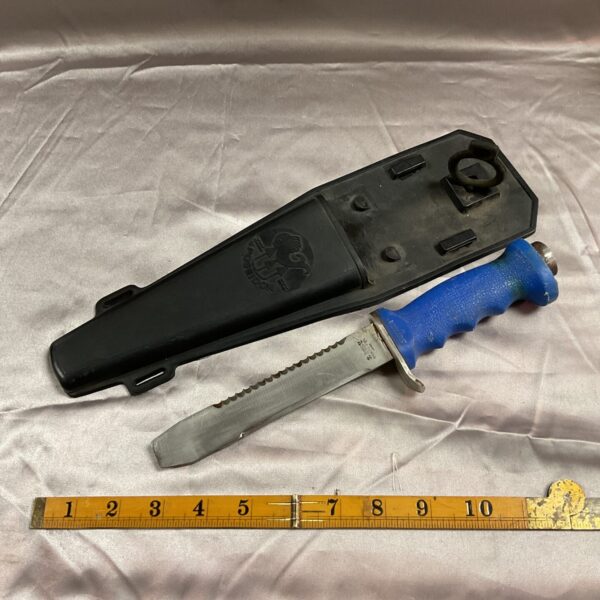 Poseidon Zest divers knife with black sheath and leg strap.
