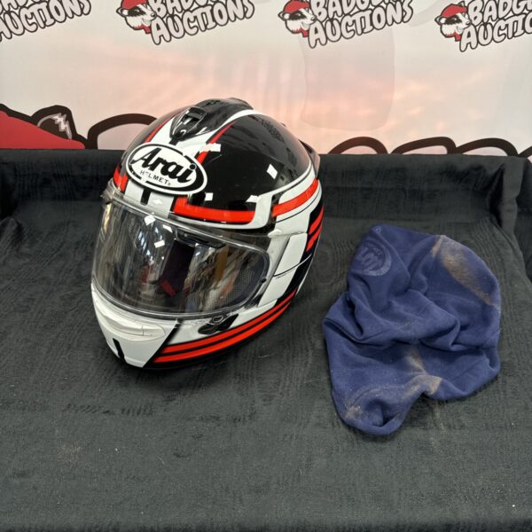 Arai XL motorcycle helmet in racing colours.