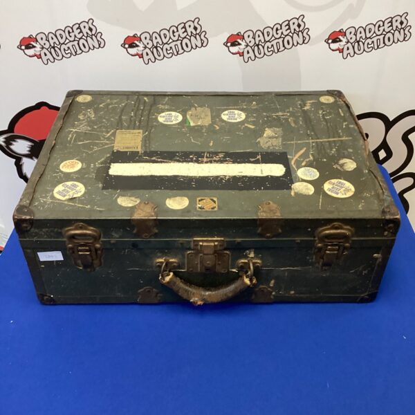 Vintage military travel case with canvas exterior and wooden frame.