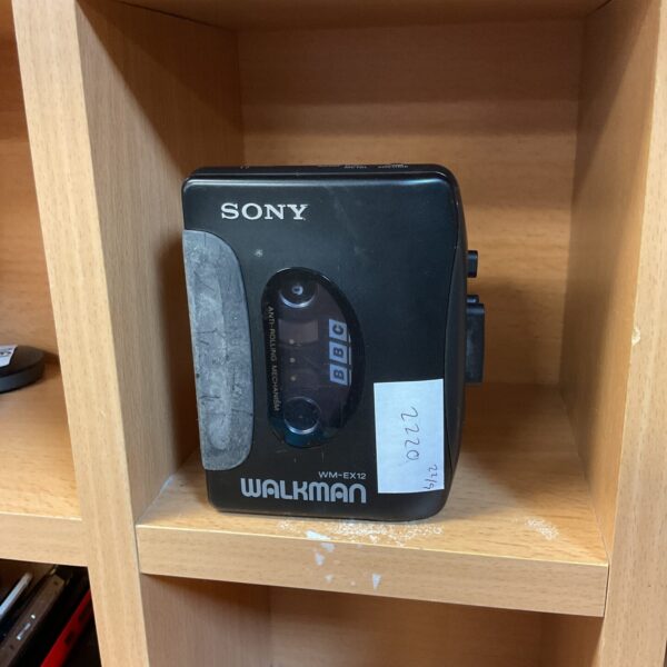 Vintage Sony WM-X12 Walkman cassette player in close-up.