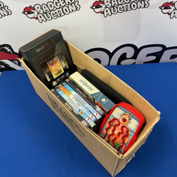 Mixed lot of PC games and a Kindle Fire HD tablet.