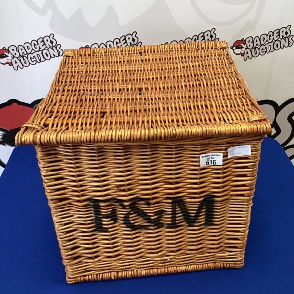 Vintage wicker hamper, ideal for storage or picnics.