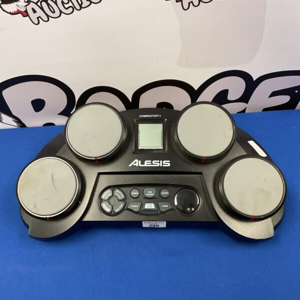 Alesis Compact Kit 4 electronic drum kit, portable MIDI controller for music production.