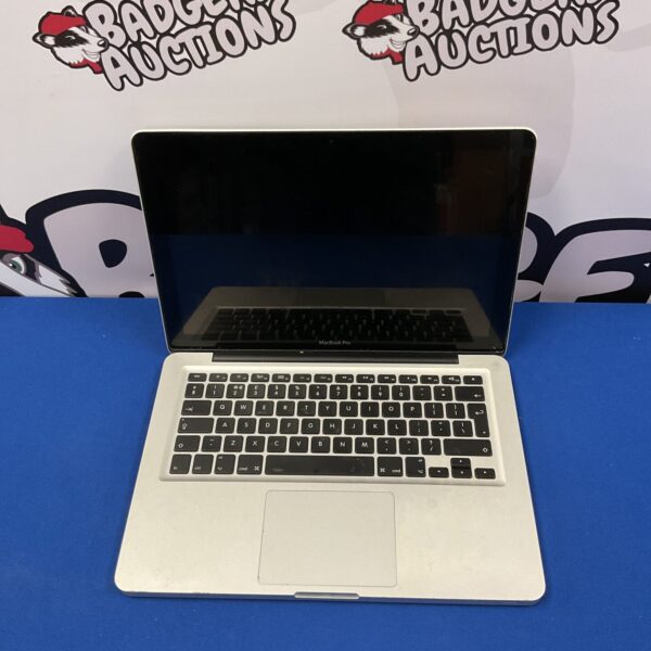 Silver Apple MacBook Pro A1278 laptop, vintage computer for auction.