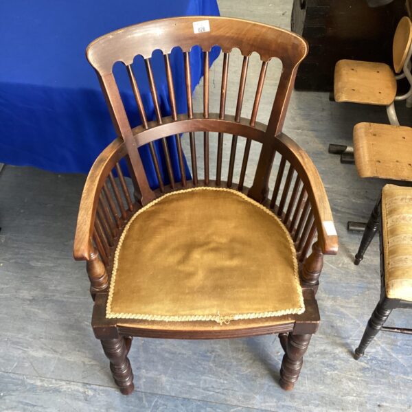 Late Victorian walnut Windsor chair with patterned seat.