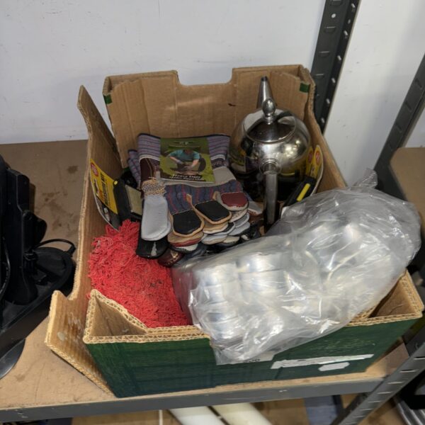 Mixed lot of gloves and tealights in a cardboard box.