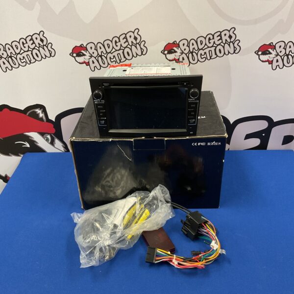 Front view of a used car stereo system with digital display.