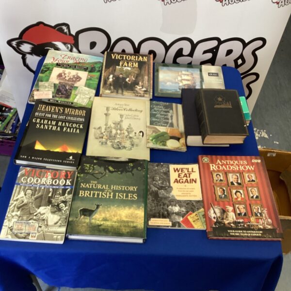 Mixed book lot including tracing your roots and natural history books.