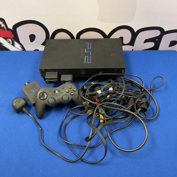 Black Sony PlayStation 2 console with controller and cables.