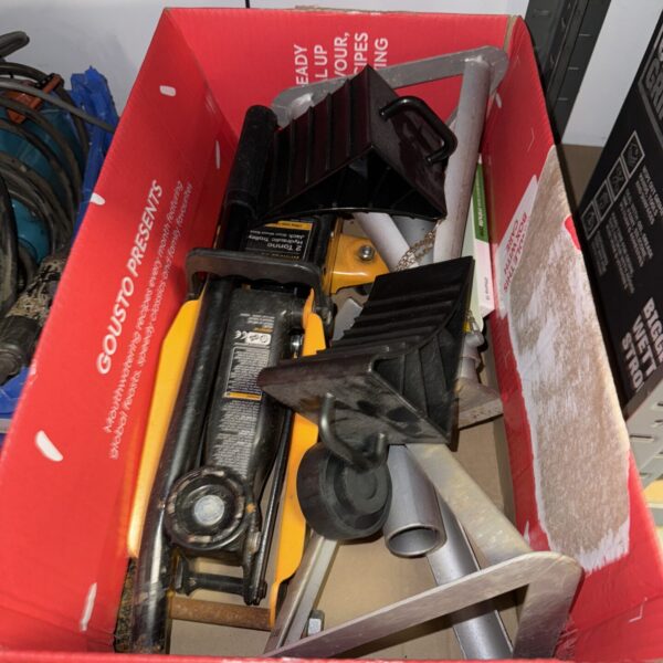 Car lifting equipment set including trolley jack and axle stands.