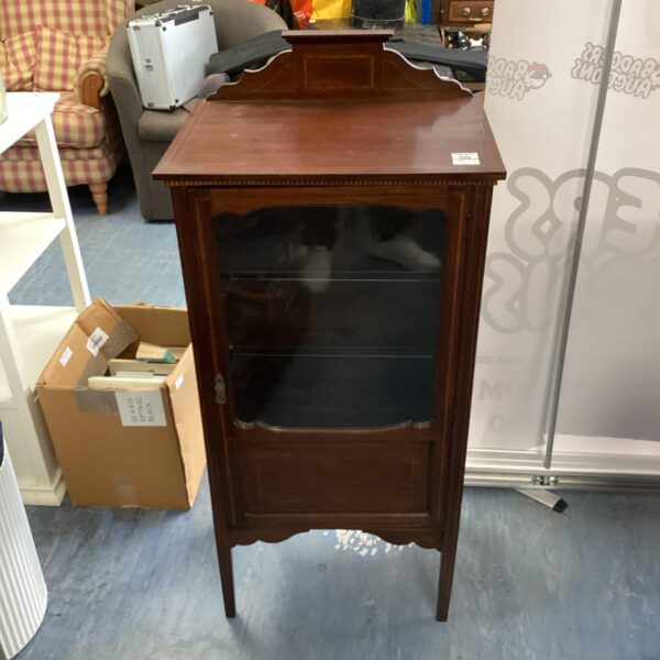 Antique mahogany display cabinet with inlaid glass front.