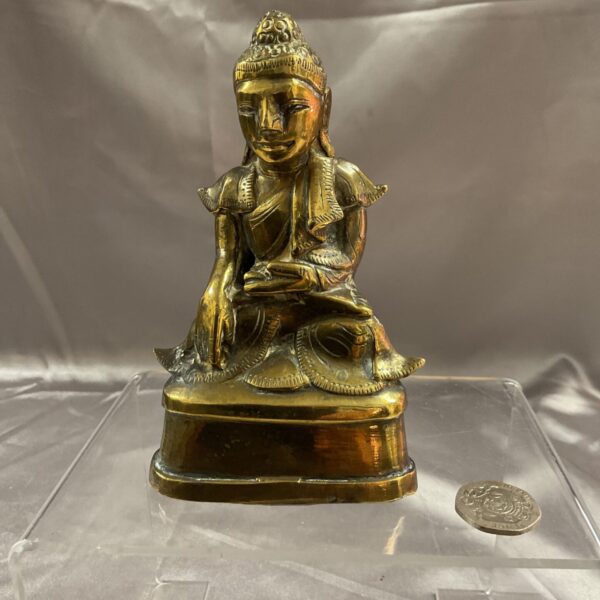 Antique 19th-century Indian brass Buddha sculpture for collectors.