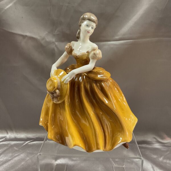 Vintage Coalport Teresa figure in flowing Victorian gown.