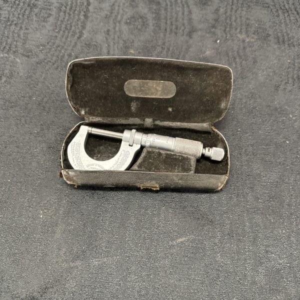 Vintage Moore & Wright micrometer in its original wooden case.