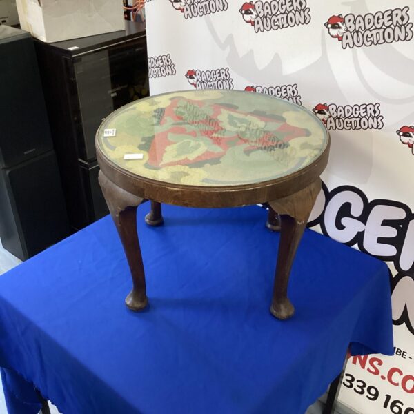 Antique Queen Anne style oak table with glass top.
