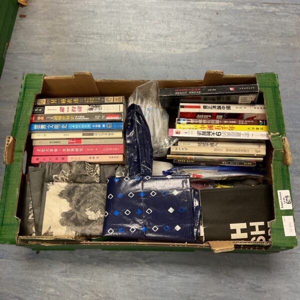 Vintage lot of Japanese books, shopping bags, and pens for collectors.