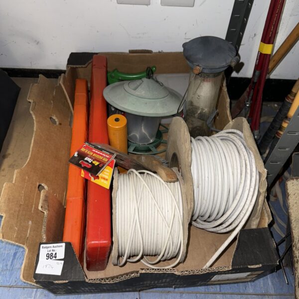 Mixed shed clearance lot with bird feeder and garden tools.