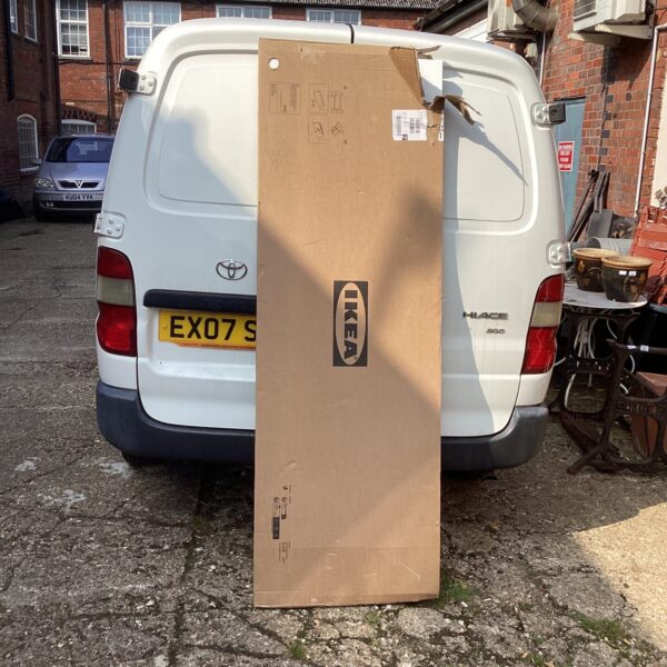 Boxed Ikea white kitchen worktop ready for installation.