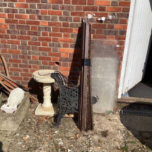 Vintage cast iron garden bench kit with floral details.