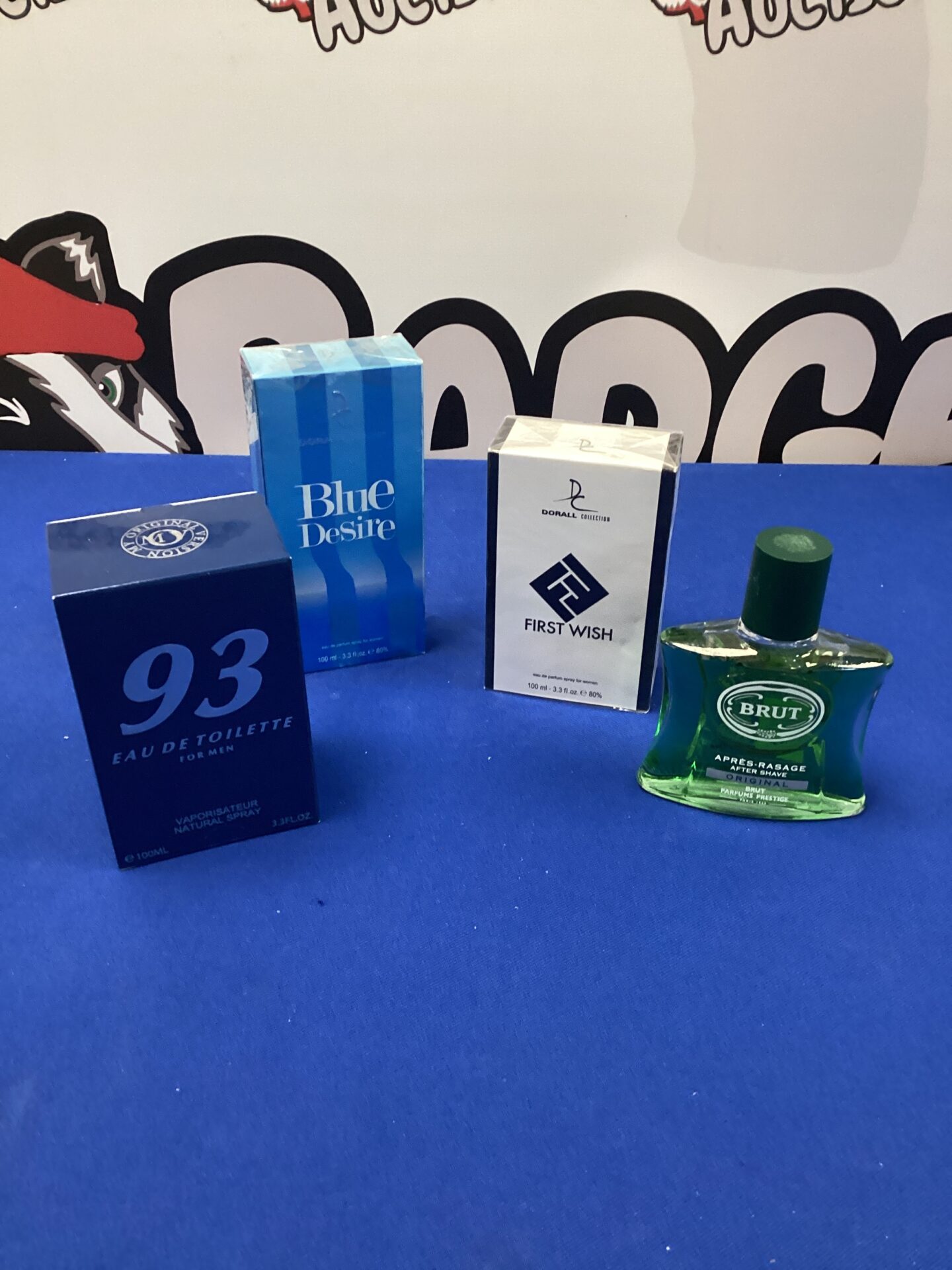 766 Four bottles of aftershave inc brut, blue desire, first wash & 93 eau de toilette