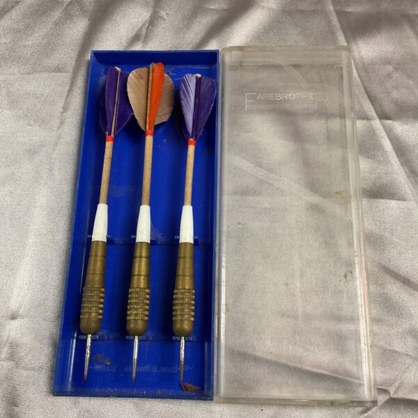 Vintage Farebrother Concentric brass darts in aged condition.