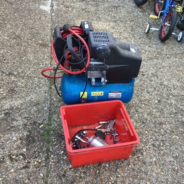 Ferrex air compressor with included spray kit for DIY projects.