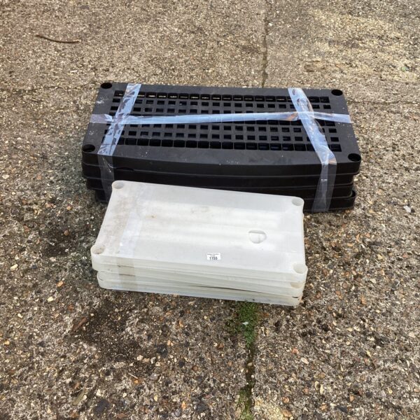 Two sets of used plastic garage shelving for storage.
