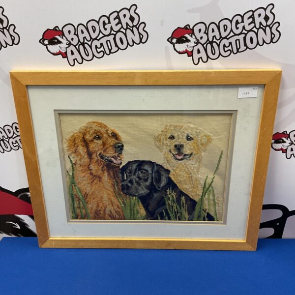 Framed vintage tapestry featuring a study of labrador dogs.