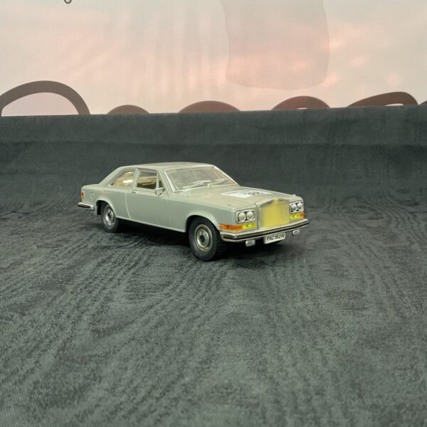 Silver Rolls Royce Camargue diecast model car on display.