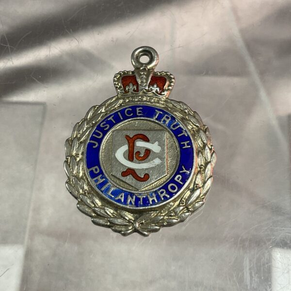 Antique silver Masonic fob medal with "Justice Truth Philanthropy" motto.