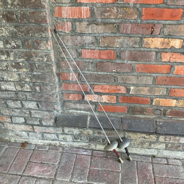 Vintage fencing foils, Leon Paul swords, sporting equipment.