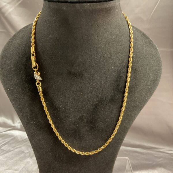 Elegant gold tone Swarovski rope chain necklace.