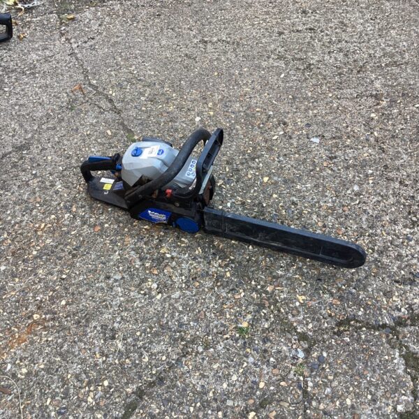 Used Mac Allister petrol chainsaw for garden and DIY tasks.