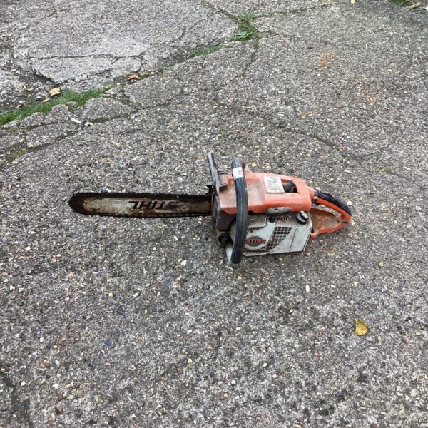 Vintage Stihl petrol chainsaw for garden and DIY tasks.