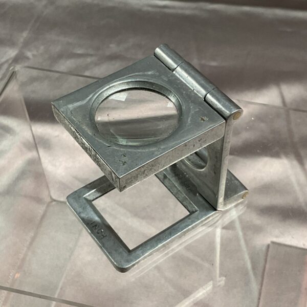 Vintage Taylor’s Weft magnifying glass by N&B Ltd for textile inspection.