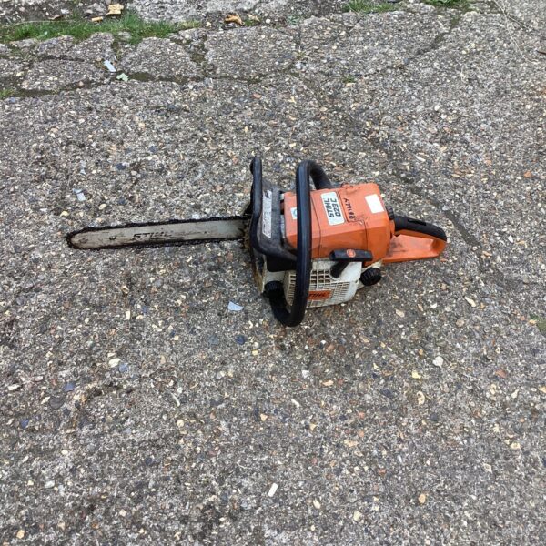 Vintage Stihl 023c chainsaw for sale, a classic petrol garden tool.