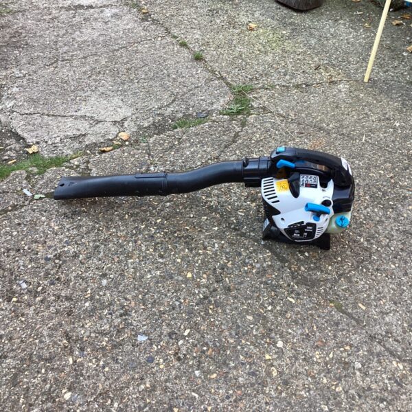 Used Mac petrol leaf blower for garden maintenance.