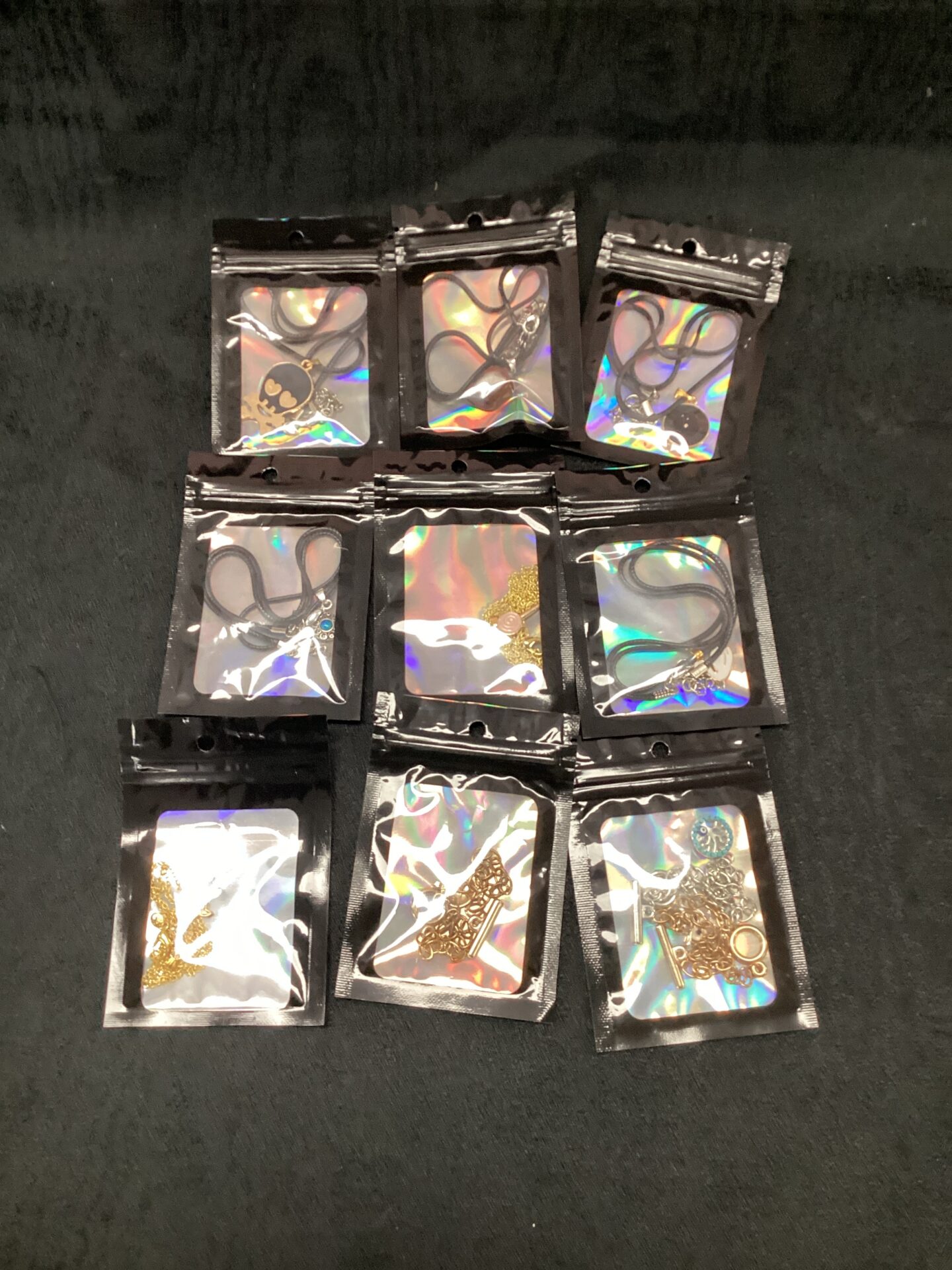 826 Nine bags of new pendant necklaces
