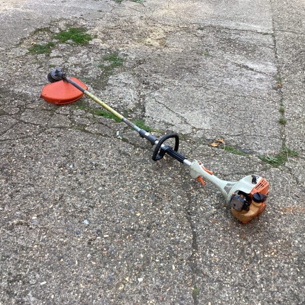 Used Stihl petrol strimmer for garden maintenance.