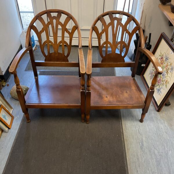 Vintage 1930s patterned nursing chair with shaped arms.