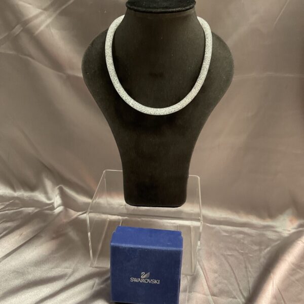 Sparkling Swarovski crystal necklace in silver tone.