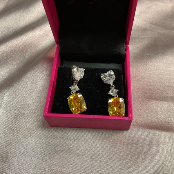 Vintage citrine drop earrings with yellow gemstones.