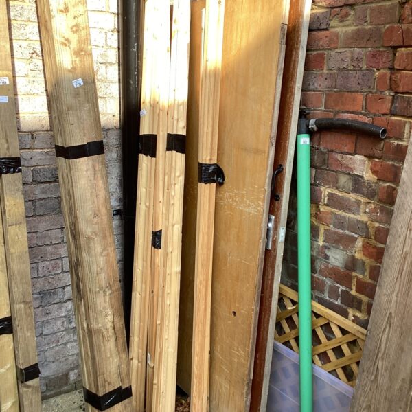 Stack of skirting board and door lining timber lengths.