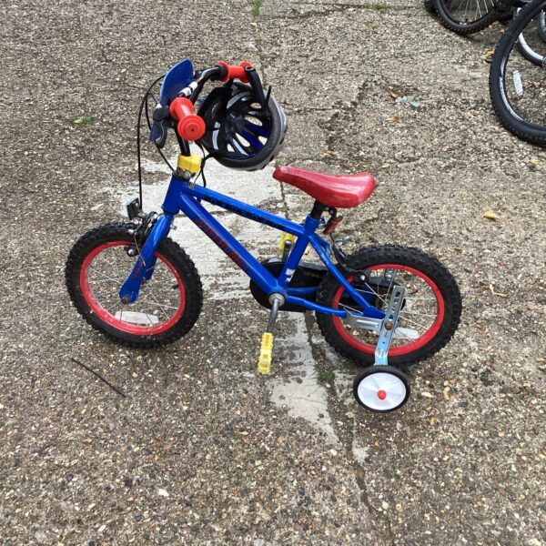 Blue Spiderman child’s bike with stabilisers, side view.