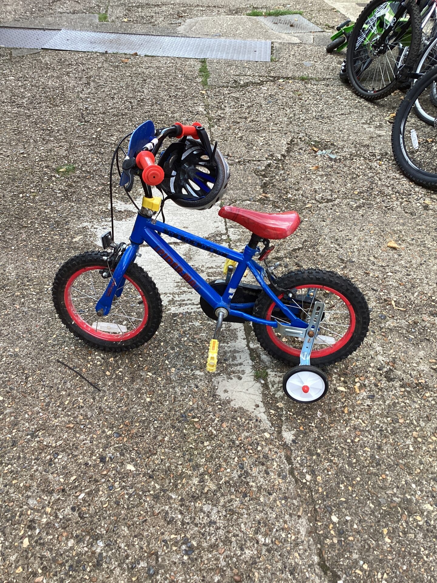 1186 Spiderman childs bike with helmet