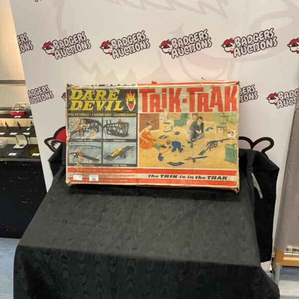 Vintage Dare Devil Traik Trak toy track set, colourful cardboard.