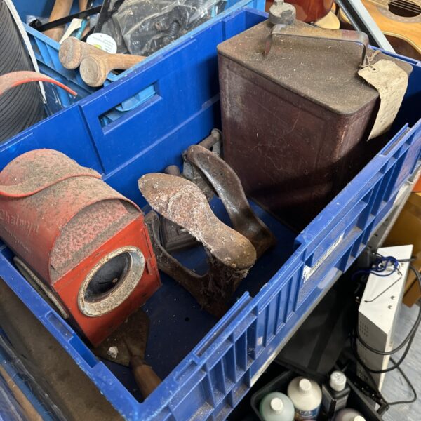 Vintage railway lantern in a blue crate, antique brass signal lamp.
