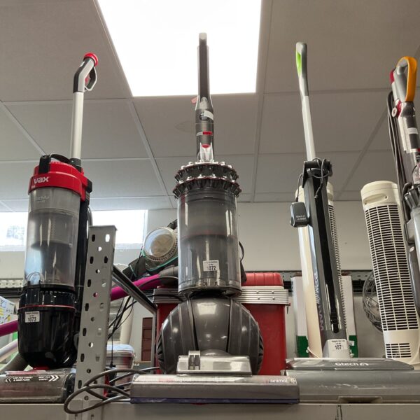 Used Dyson Cinetic Big Ball vacuum cleaner for home cleaning.